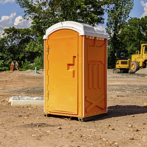 what is the cost difference between standard and deluxe portable restroom rentals in Buhl